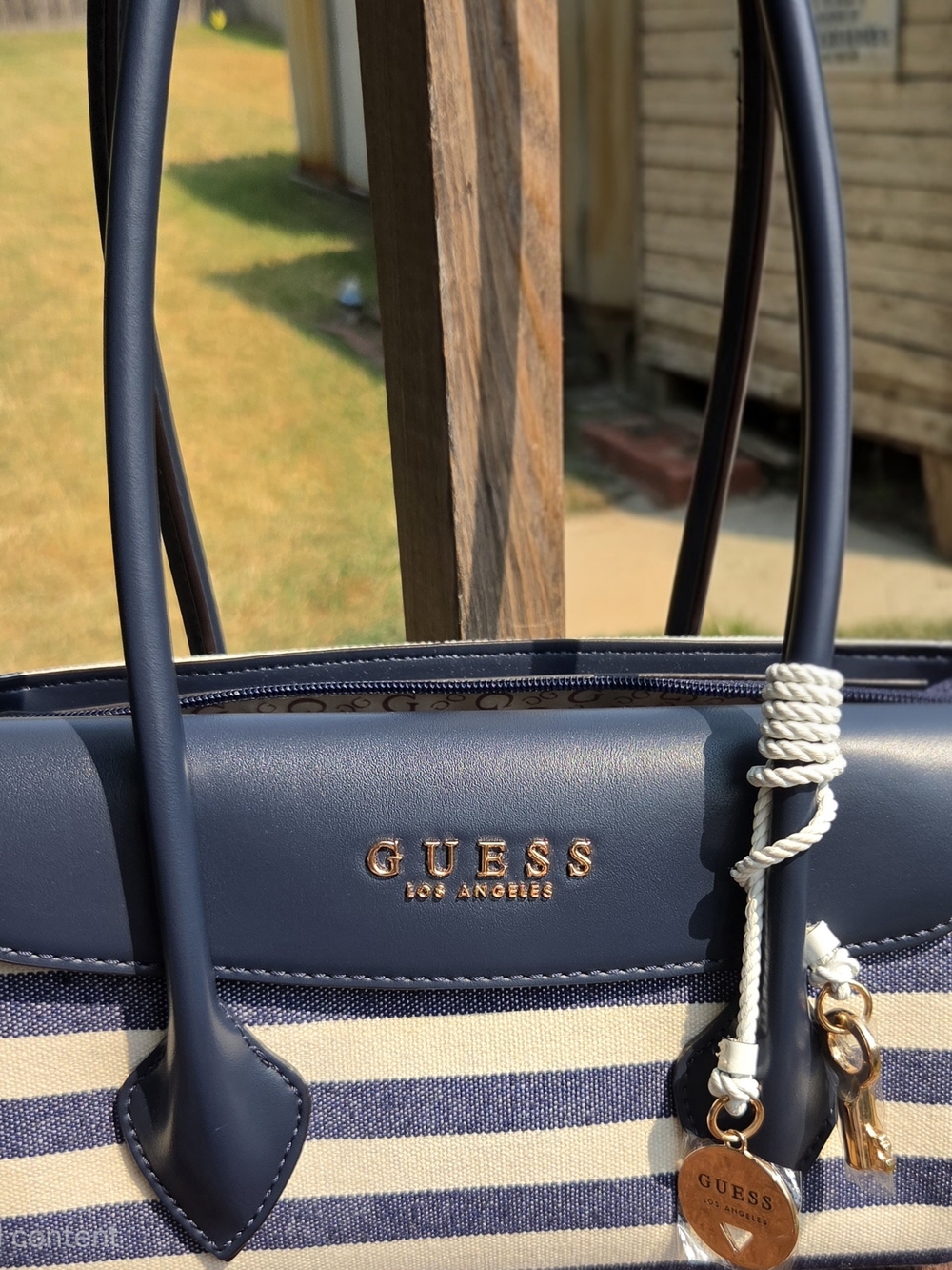 GUESS Navy and Cream Striped Tote with Gold Logo